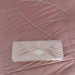 Blush evening purse with rhinestone detail